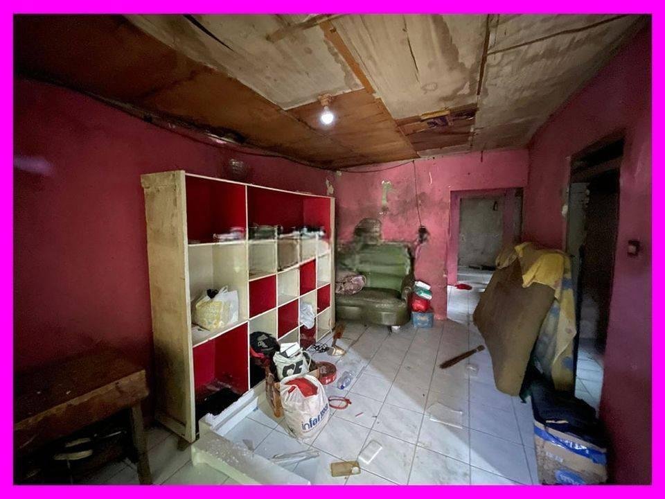 dhyana Rumah tua lt 68m2 bebas banjir di jelambar